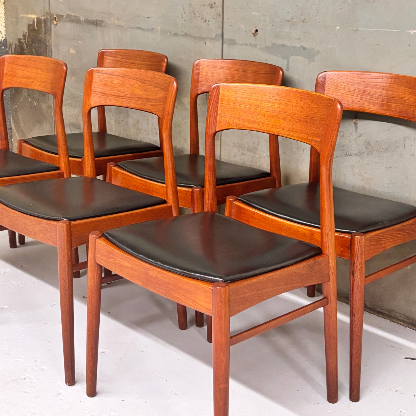 Danish Modern Sculpted Teak Dining Chairs by Henning Kjaernulf for Korup Stølefabrik